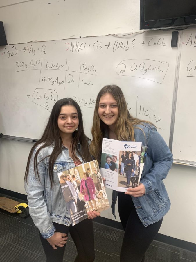 V.I.A. Club leaders, Carly Nelson and Jessica Dobrea, during a club meeting.