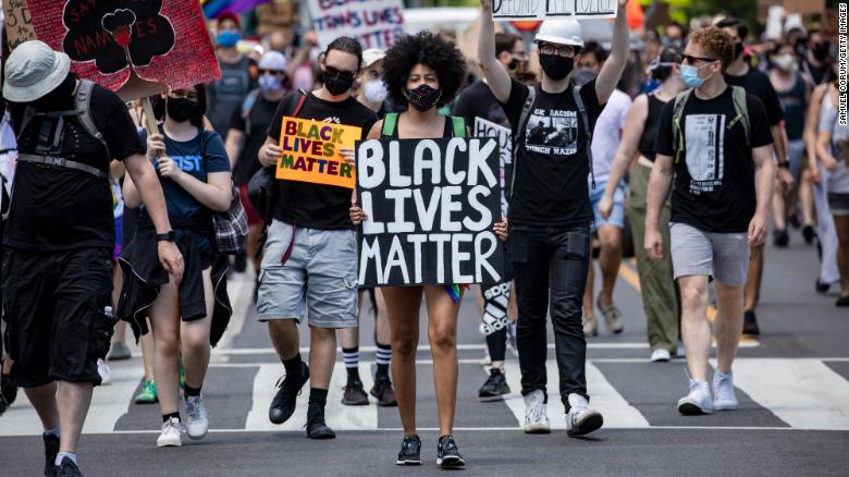 A Black Lives Matter protest in Washington D.C. marches towards the White House (Photo by Samuel Corum/Getty Images) (Courtesy of CNN)