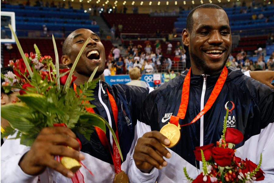 Kobe Bryant celebrates the 2008 Summer Olympics basketball first place victory with teammate LeBron James.