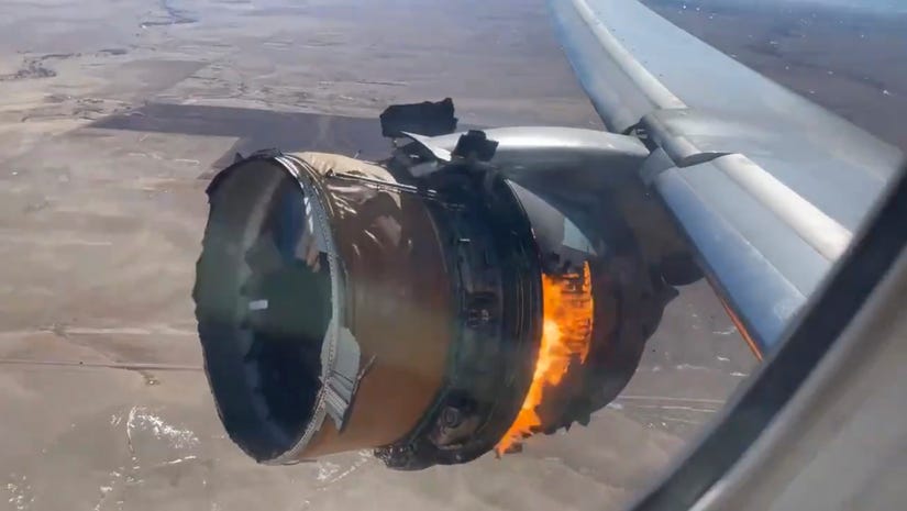 Footage taken by a passenger that shows the aircrafts right engine, which burst into flames mid-flight (Courtesy of USA Today).