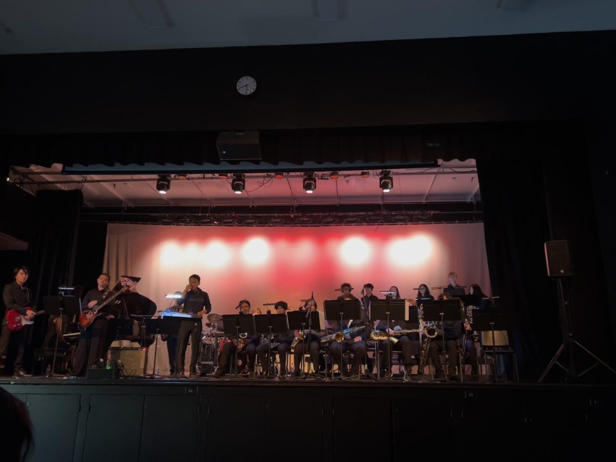 Mr. Whang is conducting the Canyon High School Jazz Band at their first show on September 26.

